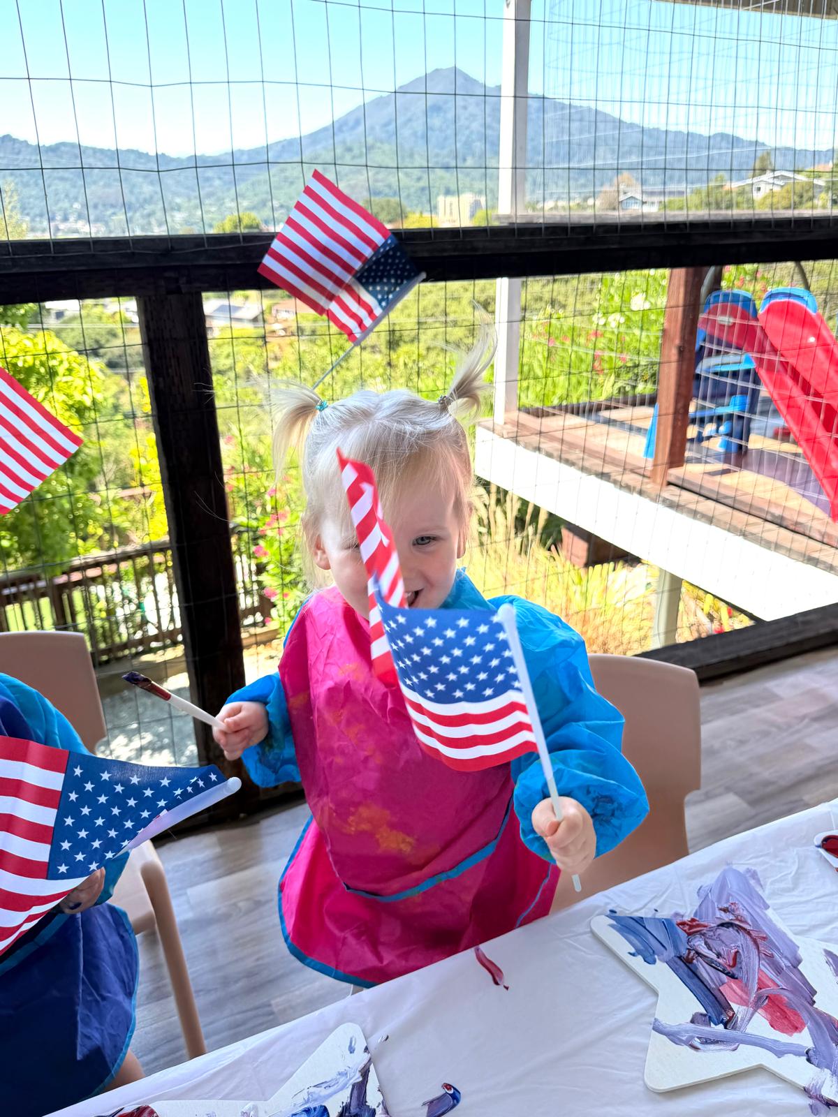 Toddler celebrating Memorial Day at Discovery Time Daycare Greenbrae CA